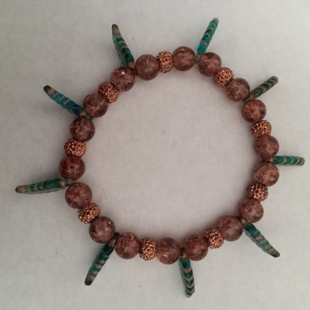 Hand Crafted Rose gold and crystal leaf spike beaded statement stretchy Bracelet